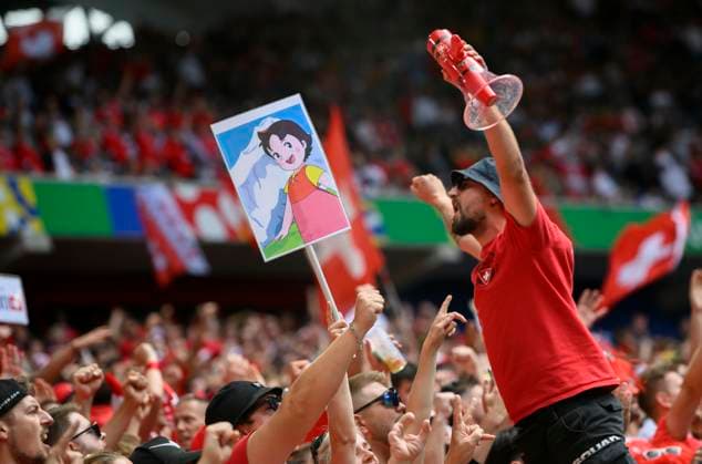 Feature, SUI fans with Heidi poster, quarter final, match M48, England ENG Switzerland SUI 5 3 n E , on 06 07 2024 in Duesseldorf Germany European Football Championship 2024 from 14 06 14 07 2024 in Germany Â
