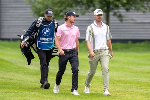 Freddy Schott on his way to the green with Kristian Krogh Johannessen, BMW International Open 2024, Golf, 07 07 2024 Munich Bavaria Germany Copyright: xkolbert-press UlrichxGamelx