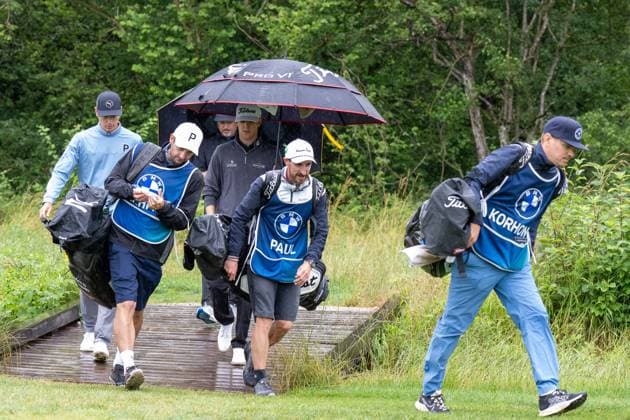 Matti Schmid, Mikko Korhonen and Jeremy Paul with the caddies on the way to the green, BMW International Open 2024, Golf, 07 07 2024 Munich Bavaria Germany Copyright: xkolbert-press UlrichxGamelx