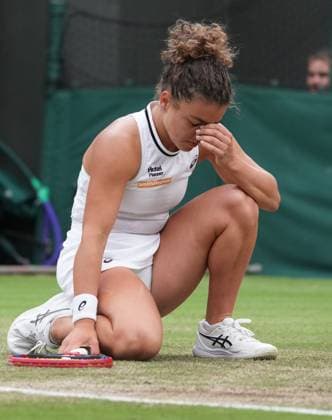 Lawn Tennis - 2024 Wimbledon Championship Jasmine Paolini (ITA) v Madison Keys (USA) All England Lawn Tennis & Croquet Club - Sunday 7th July 2024 Jasmine Paolini (ITA) drops to her knees after a missed shot 