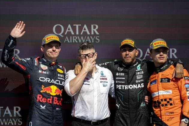 SILVERSTONE - (L-R) Lewis Hamilton (Mercedes), Peter Bennington (Mercedes), Max Verstappen (Red Bull Racing) and Lando Norris (McLaren) on the podium after the British Grand Prix at the Silverstone Circuit. ANP SANDER KONING xVIxANPxSportx xxANPxIVx 502994012 originalFilename: 502994012.jpg