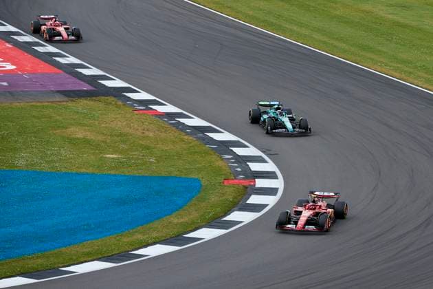 F1 Grand Prix of Great Britain Carlos Sainz of Spain driving the (55) Scuderia Ferrari SF-24 on track, Lance Stroll of Canada driving the (18) Aston Martin Aramco F1 Team AMR24 Mercedes on track and Charles Leclerc of Monaco driving the (16) Scuderia Ferrari SF-24 on track during the F1 Grand Prix of Great Britain at Silverstone Circuit on July 7, 2024, in Northampton, England. Northampton Silverstone Circuit Northampton England RL_GPF1GB24_01076 Copyright: xRicardoxLarreinax