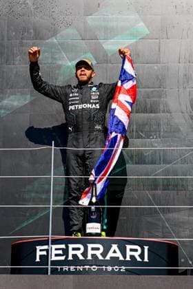 p7th July 2024; Silverstone Circuit, Northamptonshire, England; Formula 1 2024 Qatar Airways British F1 Grand Prix; Race Day; Lewis Hamilton (44) of Mercedes celebrates on the podium after winning Lewis Hamilton (44) of Mercedes is interviewed after winning the British Grand Prix  ActionPlus12665812 SimonxWest
