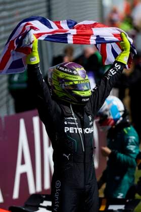 F1 Grand Prix of Great Britain Lewis Hamilton of Great Britain and Mercedes AMG Petronas F1 Team celebrates in Parc Ferme with a Union flag during the F1 Grand Prix of Great Britain at Silverstone Circuit on July 7, 2024, in Northampton, England. Northampton Silverstone Circuit Northampton England RL_GPF1GB24_01335 Copyright: xRicardoxLarreinax