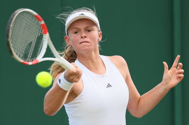 Belgian Jeline Vandromme pictured in action during a tennis match between Belgian Vandromme and Korean Jang, in round 1 of the girls singles of the 2024 Wimbledon grand slam tournament at the All England Tennis Club, in south-west London, Britain, Sunday 07 July 2024. BENOITxDOPPAGNE  x96029844x