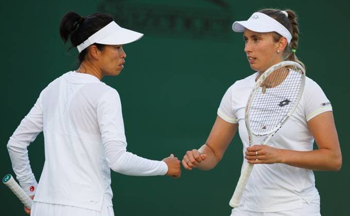 Taiwan s Su-Wei Hsieh and Belgian Elise Mertens pictured during a doubles tennis match between Belgian-Taiwanese pair Mertens-Hsieh and British pair Appleton-Miyazaki, in round 2 of the women s doubles of the 2024 Wimbledon grand slam tournament at the All England Tennis Club, in south-west London, Britain, Sunday 07 July 2024. BENOITxDOPPAGNE  x96038427x