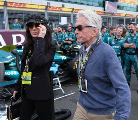 7th July 2024; Silverstone Circuit, Northamptonshire, England; Formula 1 2024 Qatar Airways British F1 Grand Prix; Race Day; Michael Douglas and Catherine Zeta Jones walking down the grid  ActionPlus12666149 PaulxBonser