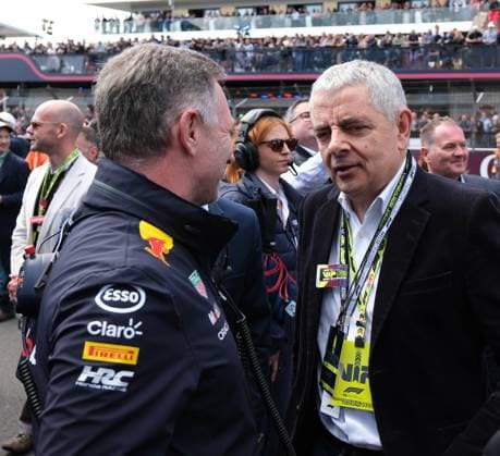 7th July 2024; Silverstone Circuit, Northamptonshire, England; Formula 1 2024 Qatar Airways British F1 Grand Prix; Race Day; Rowan Atkinson talking to Red Bull Principal, Christian Horner on the grid prior to the race  ActionPlus12666158 PaulxBonser