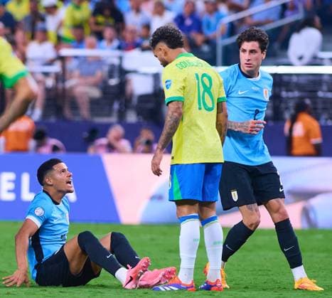 RECORD DATE NOT STATED Copa America USA 2024 Uruguay vs Brazil - Quarter-final Maximiliano Araujo of Uruguay and Douglas Luis (R) of Brazil during the CONMEBOL Copa America 2024 Quarter-final match between Uruguay and Brazil, at Allegiant Stadium, on July 06, 2024 in Las Vegas, Nevada, United States. LAS VEGAS NEVADA UNITED STATES  Copyright: xJONATHANxDUENASx 20240706214618_CA_QF_2024_URU_BRA_ARAUJO226