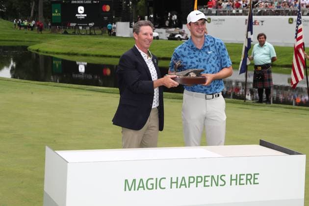 SILVIS, IL - JULiY 07: PGA, Golf Herren golfer Davis Thompson is presented with the trophy after winning the John Deere Classic on July 7,2024, at the TPC Deere Run in Silvis, Illinois. (Photo by Brian Spurlock Icon Sportswire) GOLF: JUL 07 PGA John Deere Classic EDITORIAL USE ONLY Icon24070748