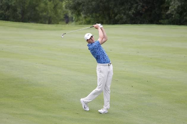 SILVIS, IL - JULiY 07: PGA, Golf Herren golfer Davis Thompson plays an iron shot on the 15th hole during the John Deere Classic on July 7,2024, at the TPC Deere Run in Silvis, Illinois. (Photo by Brian Spurlock Icon Sportswire) GOLF: JUL 07 PGA John Deere Classic EDITORIAL USE ONLY Icon24070766