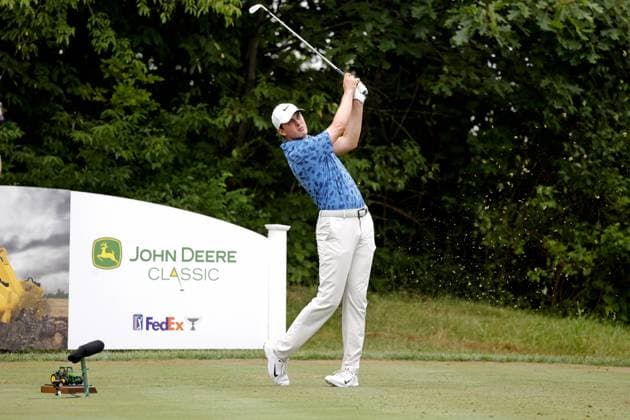 SILVIS, IL - JULiY 07: PGA, Golf Herren golfer Davis Thompson plays his tee shot on the 16th hole during the John Deere Classic on July 7,2024, at the TPC Deere Run in Silvis, Illinois. (Photo by Brian Spurlock Icon Sportswire) GOLF: JUL 07 PGA John Deere Classic EDITORIAL USE ONLY Icon24070771
