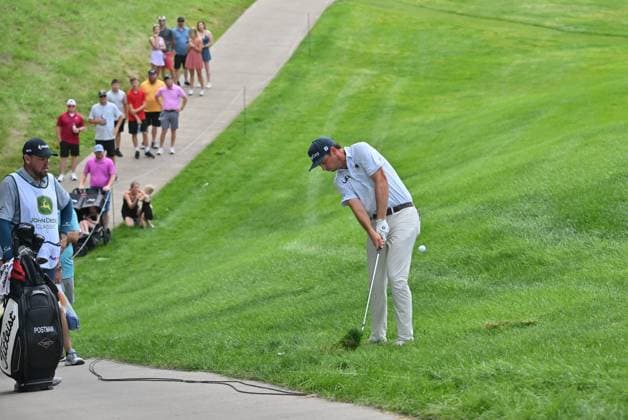 SILVIS, IL - JULY 07: J.T. Boston hits from the rough on the 6 hole as spectators look on during the final round of the John Deere Golf PGA, Golf Herren Classic on July 07, 2024, at TPC Deere Run, Silvis IL. (Photo by Keith Gillett Icon Sportswire) GOLF: JUL 07 PGA John Deere Classic EDITORIAL USE ONLY Icon24070710