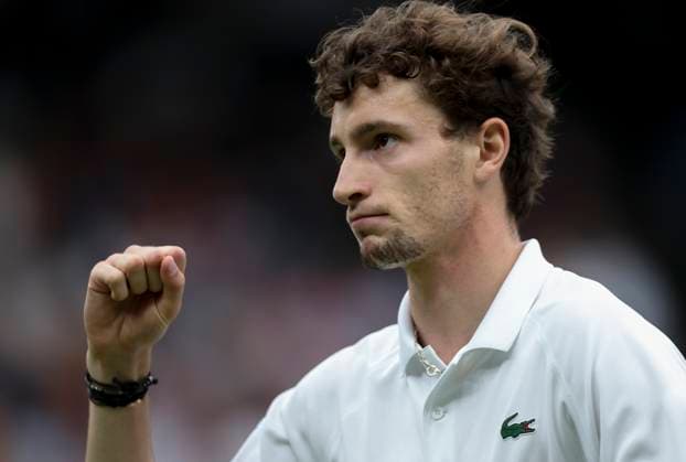 (240708) -- LONDON, July 8, 2024 -- Ugo Humbert celebrates scoring during the men s singles 4th round match between Ugo Humbert of France and Carlos Alcaraz of Spain at Wimbledon tennis Championship in London, Britain, on July 7, 2024. ) (SP)BRITAIN-LONDON-TENNIS-WIMBLEDON-DAY 7 HanxYan 