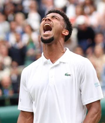 France s Arthur Fils reacts to a point in his fourth round match against Australian Alex De Minaur at the 2024 Wimbledon Championships in London on Monday, July 08, 2024.  LON2024070801 HUGOxPHILPOTT