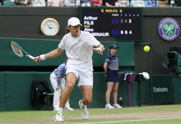 Australian Alex De Minaur plays a forehand in his fourth round match against France s Arthur Fils at the 2024 Wimbledon Championships in London on Monday, July 08, 2024.  LON2024070808 HUGOxPHILPOTT