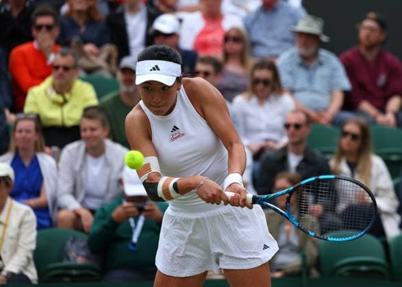 8th July 2024; All England Lawn Tennis and Croquet Club, London, England; Wimbledon Tennis Tournament, Day 8; Wang Xinyu (CHN) with a backhand shot to Elina Svitolina (UKR), ladies singles match  ActionPlus12666264 JohnxPatrickxFletcher