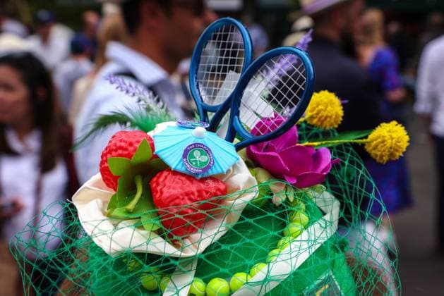 8th July 2024; All England Lawn Tennis and Croquet Club, London, England; Wimbledon Tennis Tournament, Day 8; Tennis fan wearing a Wimbledon Championships themed hat featuring rackets and strawberries  ActionPlus12666267 JohnxPatrickxFletcher