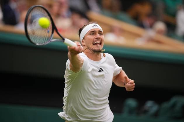 LONDON, ENGLAND - JULY 08: Alexander Zverev of Germany hits a volley against Taylor Fritz of United States in the Gentlemen s Singles fourth round match during day eight of The Championships Wimbledon 2024 at All England Lawn Tennis and Croquet Club on July 08, 2024 in London, England.  Copyright: xHiroshixSatox