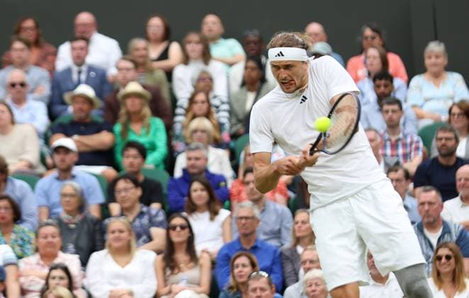 Germany s Alexander Zverev plays a backhand in his fourth round match against USA s Taylor Fritz at the 2024 Wimbledon Championships in London on Monday, July 08, 2024.  LON2024070831 HUGOxPHILPOTT
