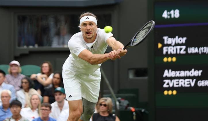 Germany s Alexander Zverev plays a backhand in his fourth round match against USA s Taylor Fritz at the 2024 Wimbledon Championships in London on Monday, July 08, 2024.  LON2024070833 HUGOxPHILPOTT