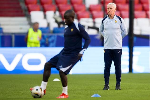 France training Didier Deschamps, head coach of France, next to N Golo Kante of France during France training on the eve of the UEFA EURO, EM, Europameisterschaft,Fussball 2024 semi-final football match against Spain. Munich Germany Copyright: xNicolòxCampox