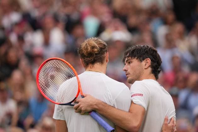 LONDON, ENGLAND - JULY 08: Taylor Fritz of United States (R) talks with Alexander Zverev of Germany at the net following victory in the Gentlemen s Singles fourth round match during day eight of The Championships Wimbledon 2024 at All England Lawn Tennis and Croquet Club on July 08, 2024 in London, England  Copyright: xHiroshixSatox