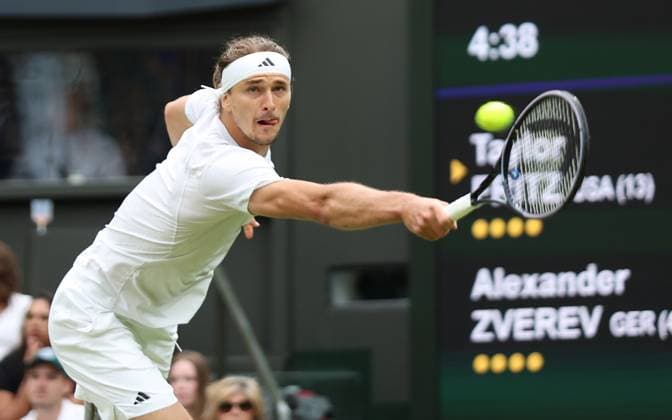 Germany s Alexander Zverev plays a backhand in his fourth round match against USA s Taylor Fritz at the 2024 Wimbledon Championships in London on Monday, July 08, 2024.  LON202407084211 HUGOxPHILPOTT
