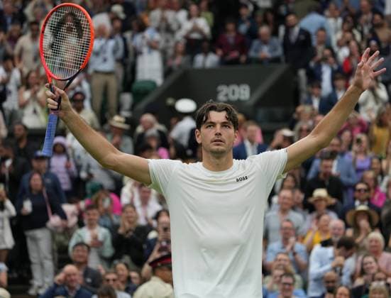 Lawn Tennis - 2024 Wimbledon Championship Mens Singles - Taylor Fritz (USA) v Alexander Zverev (GER) All England Lawn Tennis & Croquet Club - Monday 8th July 2024 Taylor Fritz (USA) celebrates winning match point 