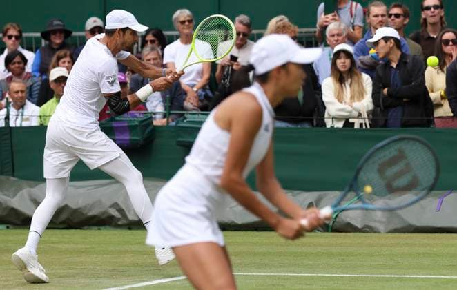 (240709) -- LONDON, July 9, 2024 -- Zhang Shuai Marcelo Arevalo (L) compete during the mixed doubles first round match between Zhang Shuai (China) Marcelo Arevalo (El Salvador) and Rajeev Ram Katie Volynets of the United States at Wimbledon tennis Championship in London, Britain, July 8, 2024. ) (SP)BRITAIN-LONDON-TENNIS-WIMBLEDON-DAY 8 HanxYan 