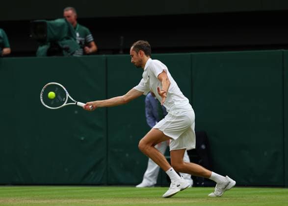 9th July 2024; All England Lawn Tennis and Croquet Club, London, England; Wimbledon Tennis Tournament, Day 9; Daniil Medvedev (RUS) from the baseline against Jannik Sinner (ITA), mens singles quarter final match  ActionPlus12666384 JohnxPatrickxFletcher