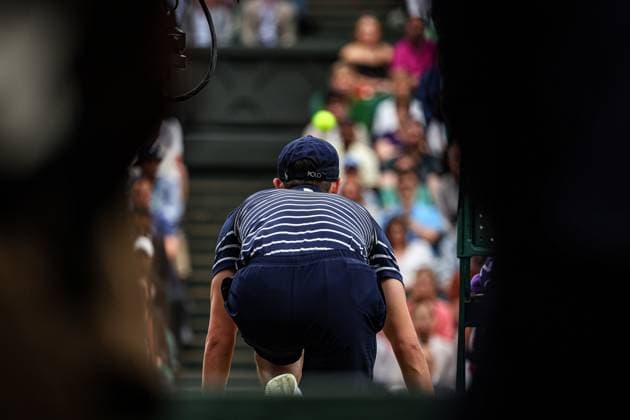 9th July 2024; All England Lawn Tennis and Croquet Club, London, England; Wimbledon Tennis Tournament, Day 9; Ball boy watches the ball fly past his face from Centre Court during the mens singles quarter final match between Jannik Sinner (ITA) vs Daniil Medvedev (RUS)  ActionPlus12666394 JohnxPatrickxFletcher