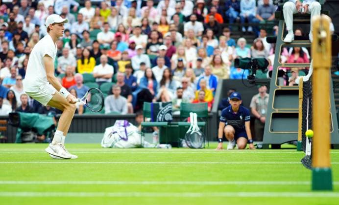 Jannik Sinner nets with a volley during his quarter final match Wimbledon Tennis Championships, Day 9, The All England Lawn Tennis and Croquet Club, London, UK - 09 Jul 2024  Copyright: xJavierxGarcia Shutterstockx 14577169bv
