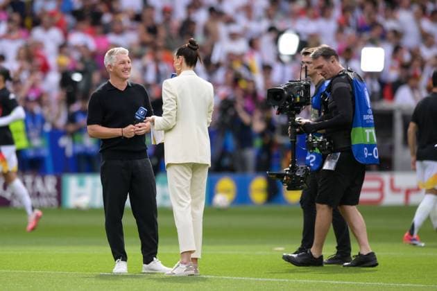 Soccer, UEFA EURO 2024 quarter-finals, 20240705, Spain Germany In the picture ARD expert Bastian SCHWEINSTEIGER and ARD reporter Esther SEDLACZEK Stuttgart Stuttgart Arena Baden Württemberg Germany Copyright: Passion2Press MarkusxFischerx