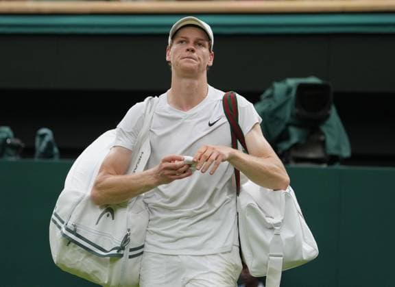 Lawn Tennis - 2024 Wimbledon Championship Yannick Sinner (ITA) v Daniil Medvedev All England Lawn Tennis & Croquet Club - Tuesday 9h July 2024 A dejected Sinner leaves centre court. 