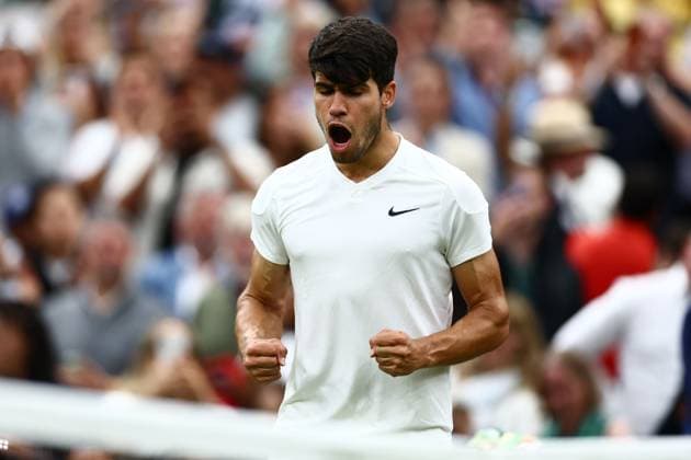 Carlos Alcaraz of Spain celebrates winning the match Wimbledon Tennis Championships, Day 9, The All England Lawn Tennis and Croquet Club, London, UK - 09 Jul 2024  Copyright: xJamesxMarsh Shutterstockx 14577170eb