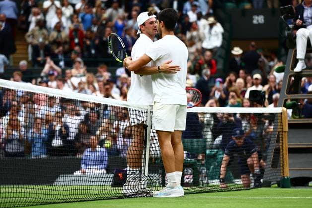 Tommy Paul of USA congratulates Carlos Alcaraz of Spain Wimbledon Tennis Championships, Day 9, The All England Lawn Tennis and Croquet Club, London, UK - 09 Jul 2024  Copyright: xJamesxMarsh Shutterstockx 14577170en