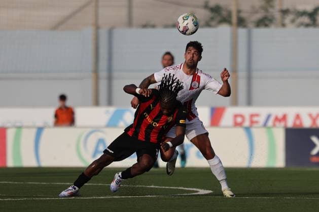 Hamrrun Spartans v Lincoln Red Imps - UEFA Champions League 2024 2025: First Qualifying Round, 1st Leg Kike Gomez (back) of Lincoln Red Imps is vying for the ball with Joseph Mbong (front) of Hamrun Spartans during the UEFA Champions League, First Qualifying Round, 1st Leg soccer match between Hamrun Spartans and Lincoln Red Imps, at the Centenary Stadium, in Ta Qali, Malta, on July 09, 2024. Ta Qali Attard Malta  Copyright: xDomenicxAquilinax originalFilename:aquilina-hamrruns240709_npebn.jpg