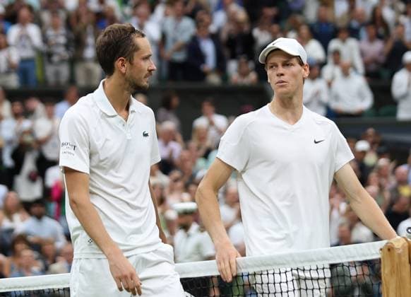 Daniil Medvedev celebrates victory in his Men s Quarter-Final match against Italy s Jannik Sinner at the 2024 Wimbledon Championships in London on Tuesday, July 09, 2024.  LON2024070931 HUGOxPHILPOTT