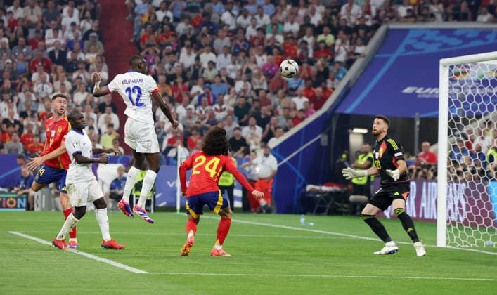 Munich, Germany, 9th July 2024. Randal Kolo Muani of France (3L) scores the opening goal during the UEFA European Championships semi final match at Allianz Arena, Munich. Picture credit should read: Paul Terry Sportimage EDITORIAL USE ONLY. No use with unauthorised audio, video, data, fixture lists, club league logos or live services. Online in-match use limited to 120 images, no video emulation. No use in betting, games or single club league player publications. SPI-3225-0035
