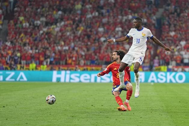 Marc Cucurella 24 Spain and Ousmane Dembele 11 France In action during the semi-final match of the European Championship Spain France on 09 07 2024 in Munich Munich Football Arena Bayern Germany