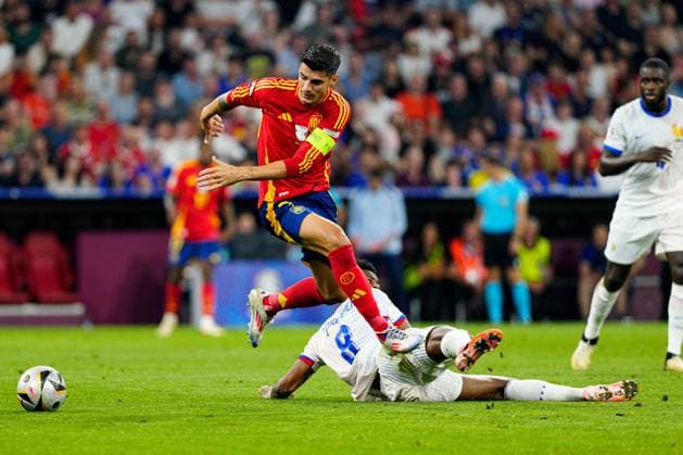 Ãlvaro Morata of Spain battles with Aurà lien Tchouamà ni of France Spain v France, UEFA European Championship, EM, Europameisterschaft 2024, Semi Final, Football, Munich Football Arena, Munich, Germany - 09 Jul 2024 EDITORIAL USE ONLY No use with unauthorised audio, video, data, fixture lists, club league logos or live services. Online in-match use limited to 120 images, no video emulation. No use in betting, games or single club league player publications. Copyright: xDavexShopland Shutterstockx 14576888cm