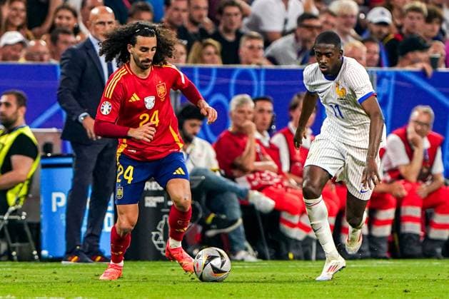 2024-07-09 Spain v France - UEFA EURO, EM, Europameisterschaft,Fussball 2024 Semi Final MUNICH, NETHERLANDS - JULY 9: Marc Cucurella of Spain battles for possession with Ousmane Dembele of France during the UEFA EURO 2024 Semi Final match between Spain and France at Munich Football Arena on July 9, 2024 in Munich, Netherlands. Munich Munich Football Arena Netherlands Content not available for redistribution in The Netherlands directly or indirectly through any third parties. Copyright: xAndrexWeeningx