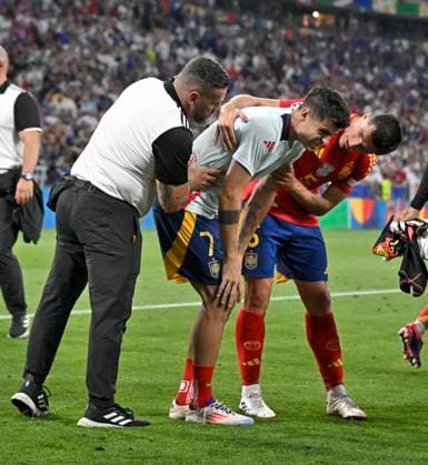 09 07 2024, Football UEFA EURO 2024, Semi-final, Spain France, at the Munich Football Arena A streaker injures Alvaro Morata Spain