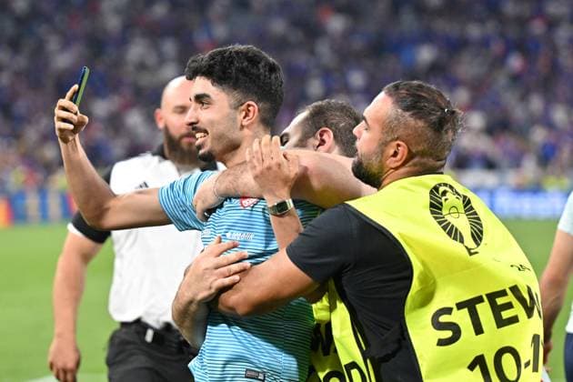 Picture shows a streaker being led away by security, 10 07 2024, Munich, Soccer, European Championship, Spain France, EVENT REGULATIONS PROHIBIT ANY USE OF PHOTOGRAPHS AS IMAGE SEQUENCES AND OR QUASI VIDEO xklx