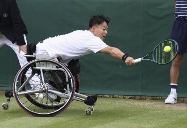 Tennis: Wimbledon championships Takashi Sanada of Japan plays against reigning Wimbledon champion Tokito Oda of Japan in the men s wheelchair singles first round at the Wimbledon tennis tournament in London on July 10, 2024.  A14AA0003120362P