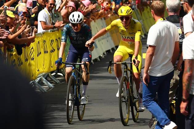 Tour de France 2024 - Stage 11 LE LIORAN, FRANCE - JULY 10 : Vingegaard Hansen Jonas (DEN) of Team Visma Lease a Bike and Pogacar Tadej (SVN) of UAE Team Emirates during stage 11 of the 111th edition of the Tour de France 2024 cycling race, a stage of 211 kms with start in Evaux-les-Bains and finish in Le Lioran on July 10, 2024 in Le Lioran, France, 10 07 2024 Le Lioran France  Copyright: xLucaxBettinix
