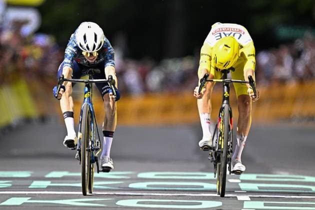 Danish Jonas Vingegaard of Team Visma-Lease a Bike celebrates as he crosses the finish line to win stage 11 of the 2024 Tour de France cycling race, from Evaux-les-Bains to Le Lioran, France (211km) on Wednesday 10 July 2024. The 111th edition of the Tour de France starts on Saturday 29 June and will finish in Nice, France on 21 July. JASPERxJACOBS  x96195599x