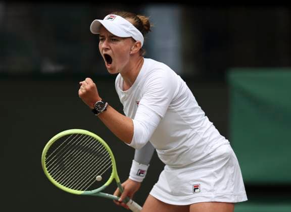 (240710) -- LONDON, July 10, 2024 -- Barbora Krejcikova of the Czech Republic reacts during the women s singles quarterfinal between Jelena Ostapenko of Latvia and Barbora Krejcikova of the Czech Republic at Wimbledon tennis Championship in London, Britain, on July 10, 2024. ) (SP)BRITAIN-LONDON-TENNIS-WIMBLEDON-DAY 10 HanxYan 
