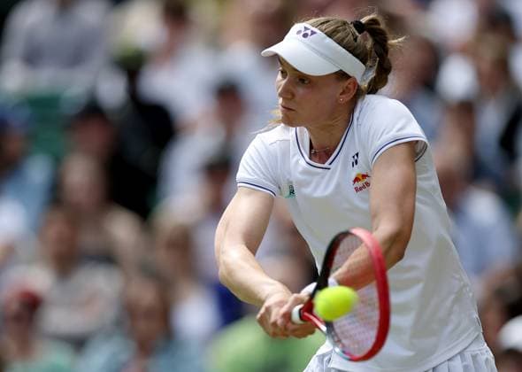 (240710) -- LONDON, July 10, 2024 -- Elena Rybakina hits a return during the women s singles quarterfinal match between Elena Rybakina of Kazakhstan and Elina Svitolina of Ukraine at Wimbledon tennis Championship in London, Britain, July 10, 2024. ) (SP)BRITAIN-LONDON-TENNIS-WIMBLEDON-DAY 10 LixYing 